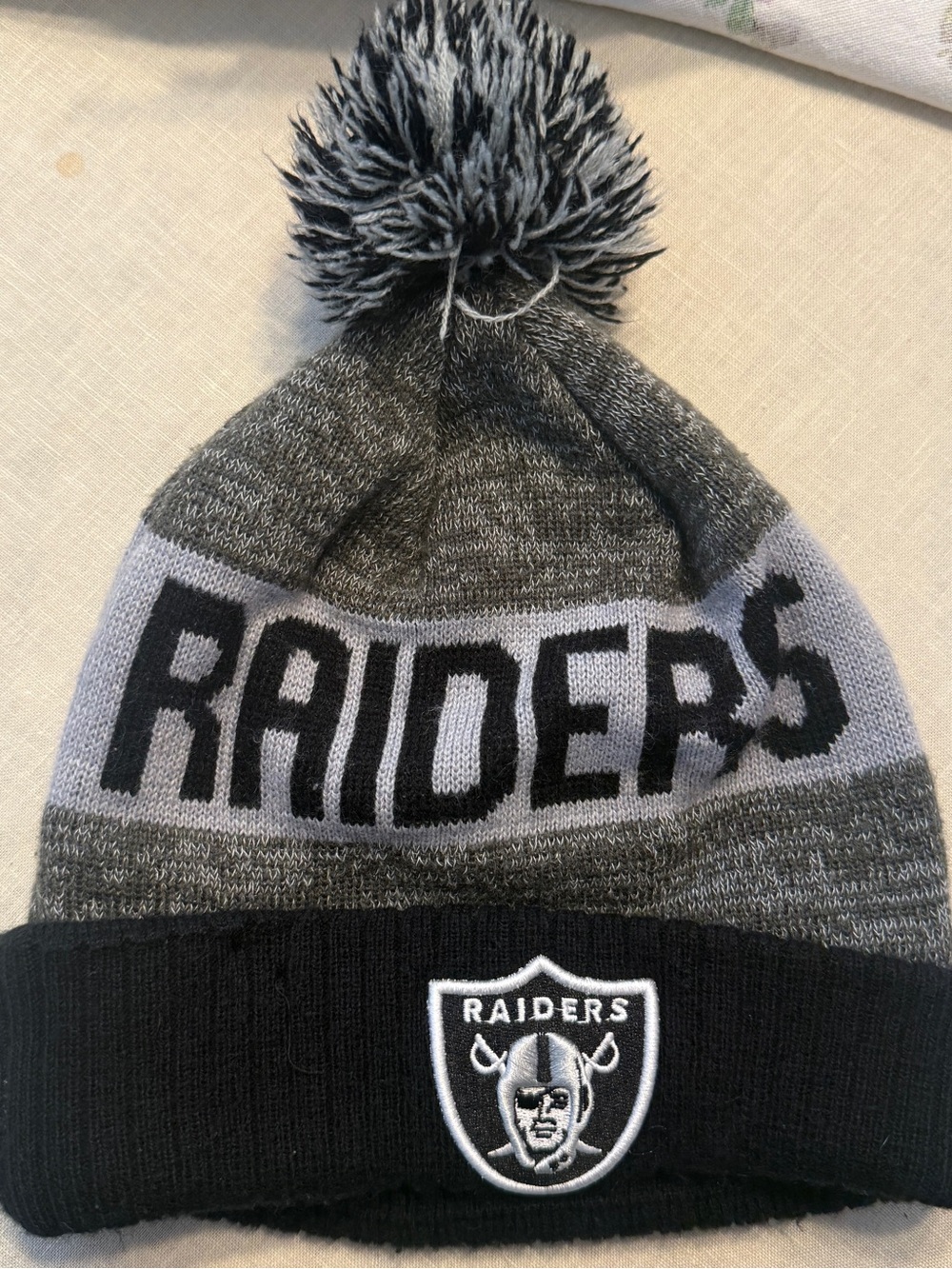 New Era Adult Raiders Pom Beanie Hat - Gray & Black NFL One Size